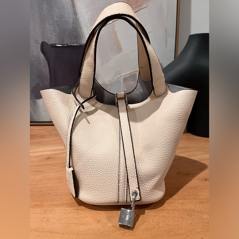 Cream bucket bag top handle - designer